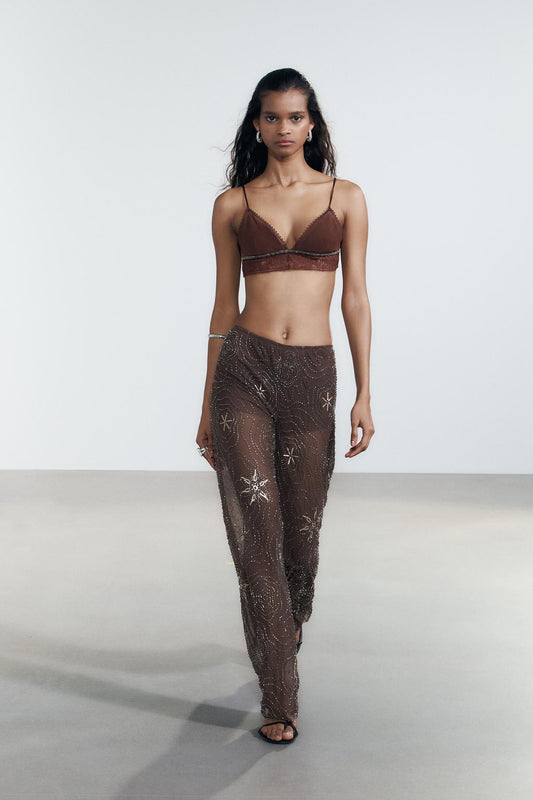 Pantalon en tulle orné de perles et de paillettes