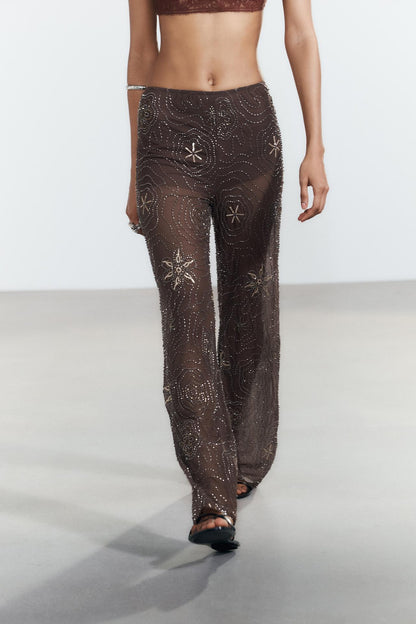 Pantalon en tulle orné de perles et de paillettes