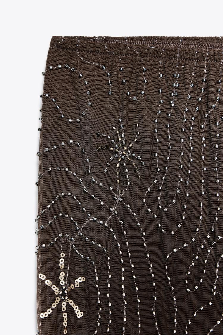 Pantalon en tulle orné de perles et de paillettes