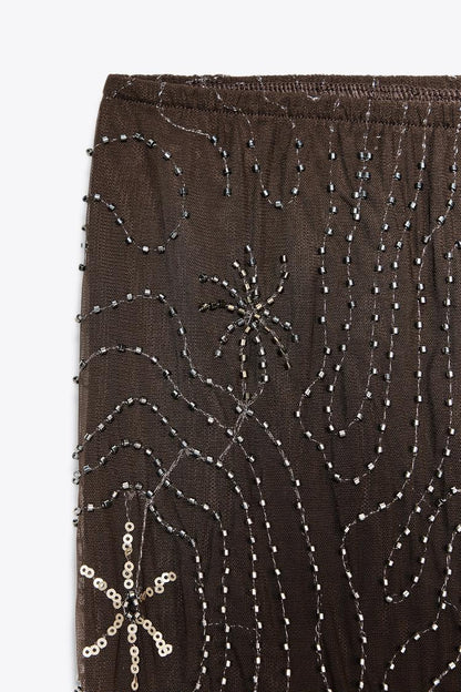 Pantalon en tulle orné de perles et de paillettes