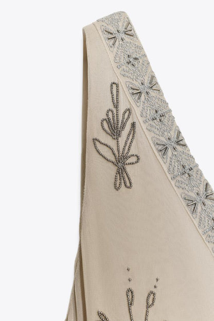 Robe longue avec broderies fantaisie